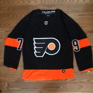 Carter Hart alternate black jersey.